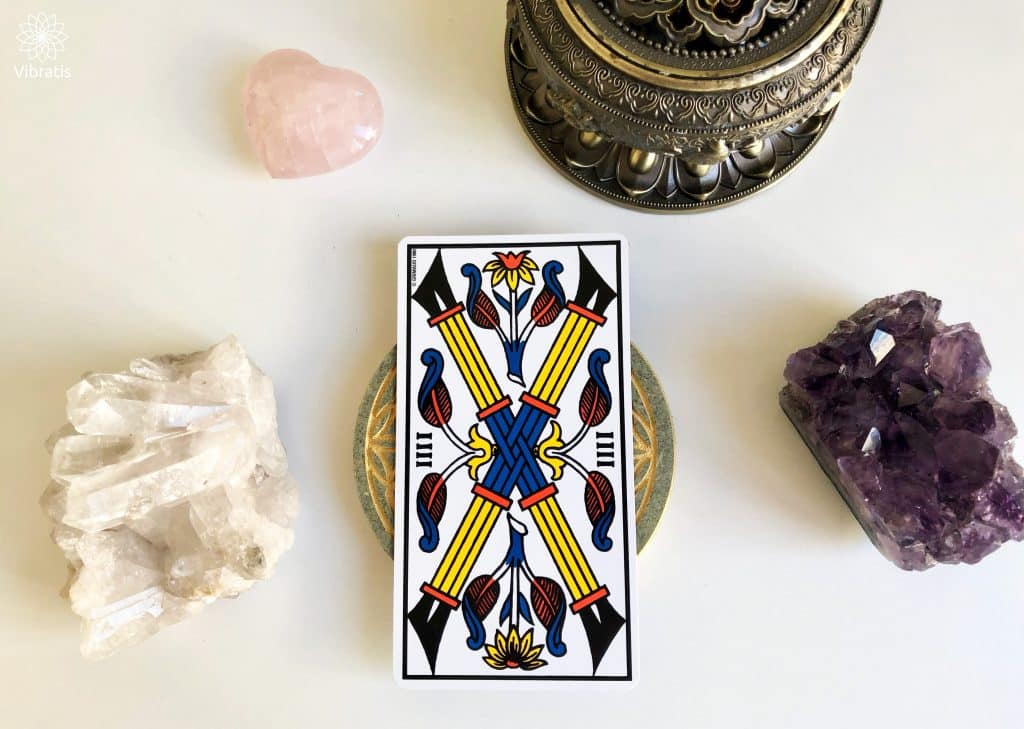 Significations du Quatre de Bâton dans le Tarot de Marseille